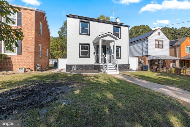 traditional home featuring a chimney and brick siding