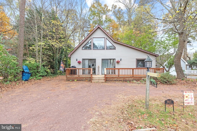 view of front of house with a wooden deck