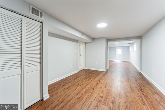 basement featuring light wood-type flooring