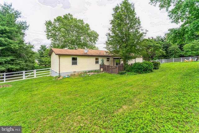 view of yard featuring a deck