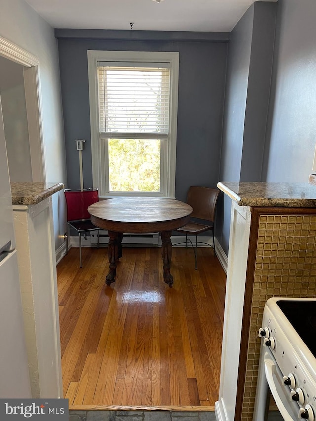 dining area featuring hardwood / wood-style flooring