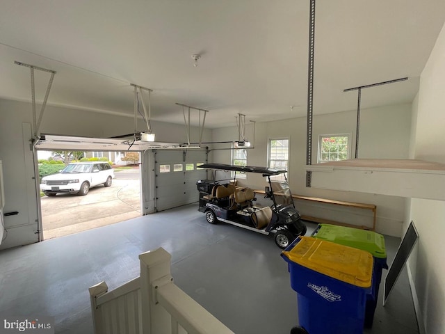 garage featuring a garage door opener