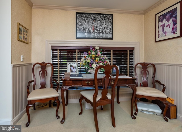 dining room featuring carpet floors and ornamental molding