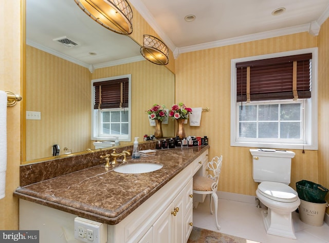 bathroom featuring vanity, tile patterned floors, crown molding, and toilet