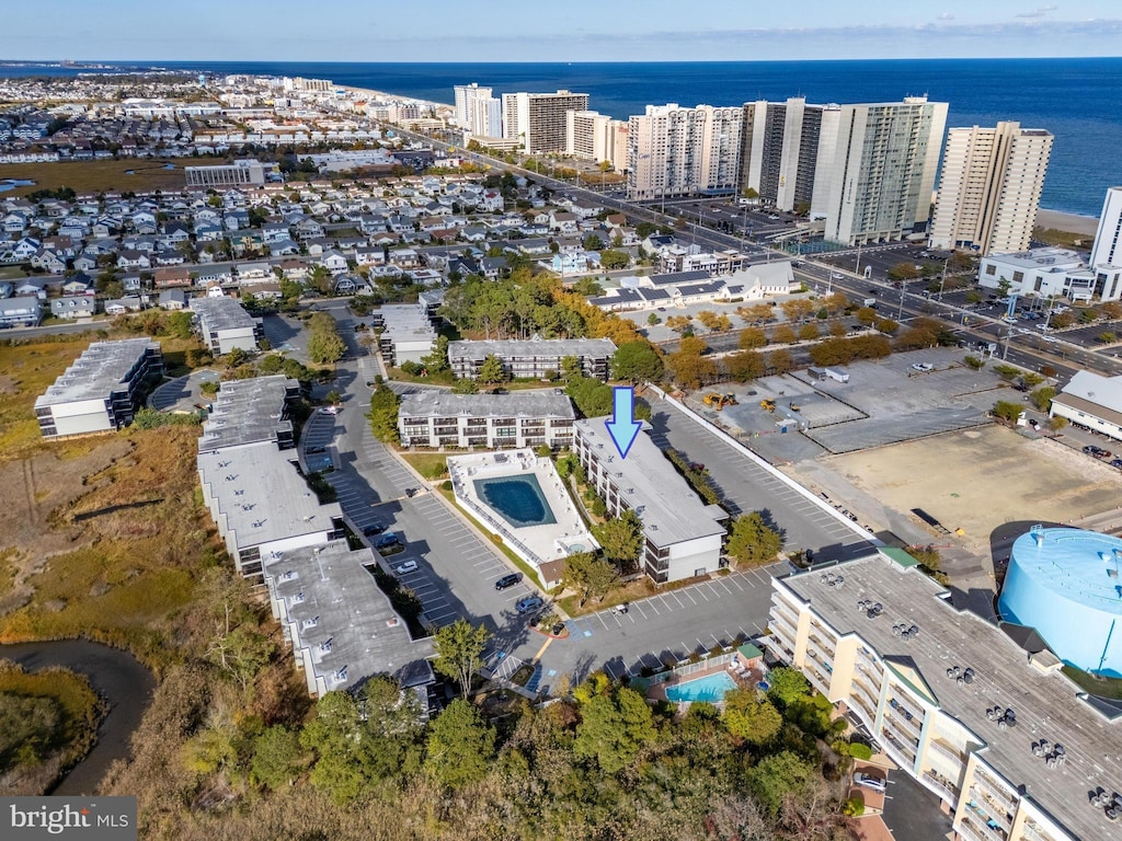 drone / aerial view with a water view