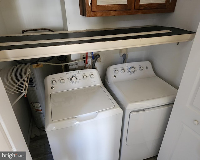 laundry room with washer and dryer