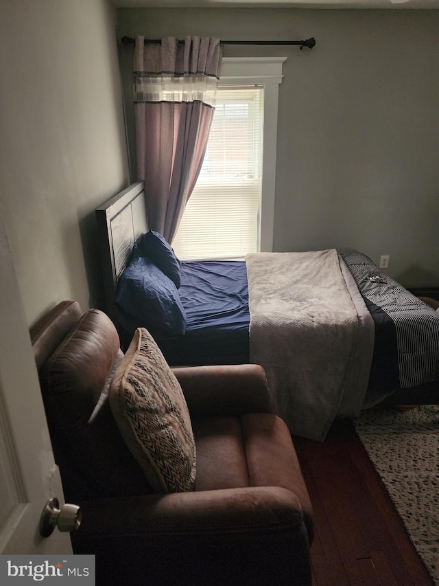 bedroom featuring wood-type flooring