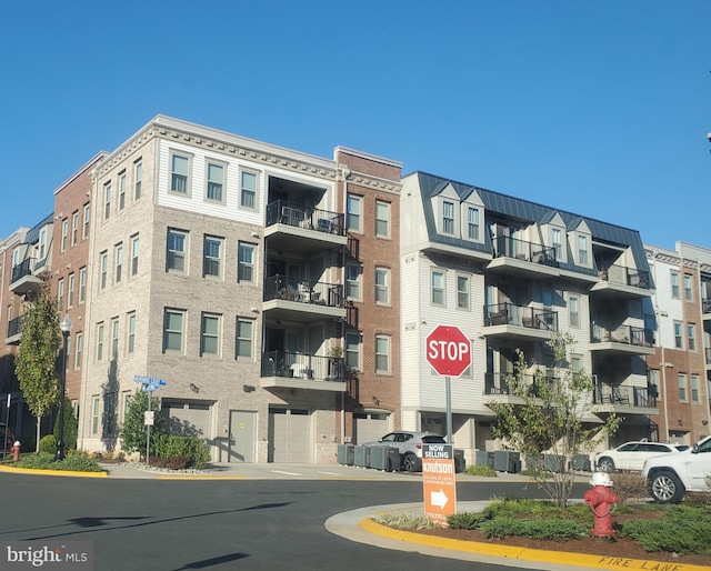 view of property with central air condition unit