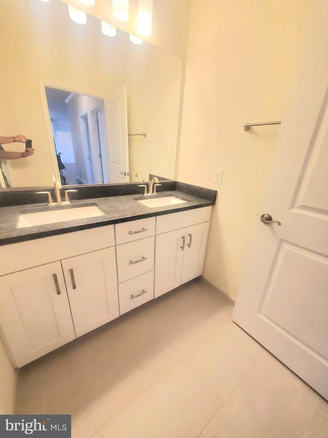 bathroom featuring vanity and tile patterned floors