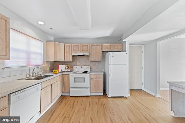 kitchen featuring light hardwood / wood-style floors, white appliances, sink, and light brown cabinets