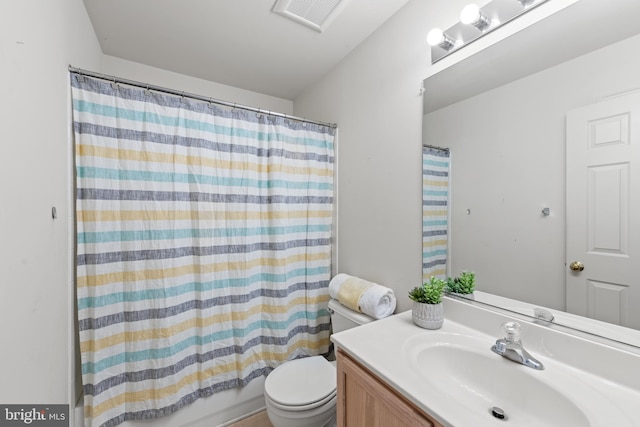 full bathroom featuring vanity, toilet, and shower / bath combo