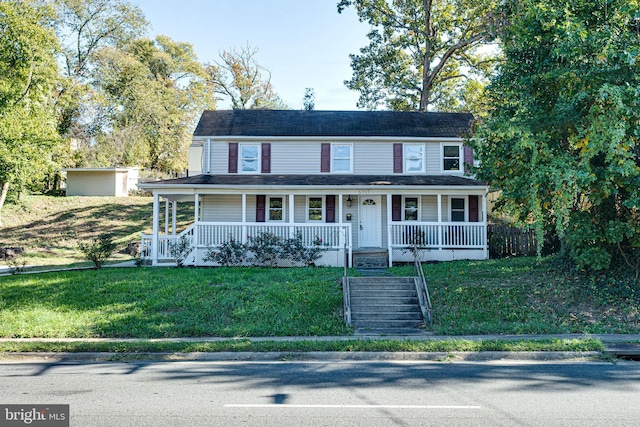 view of front of house featuring a porch and a front lawn