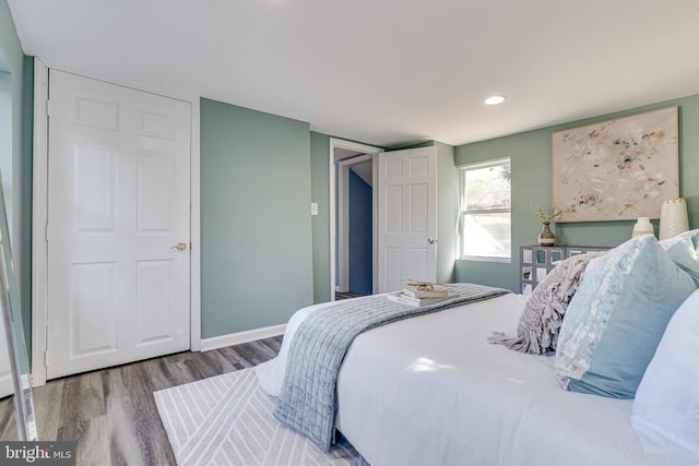 bedroom featuring hardwood / wood-style flooring