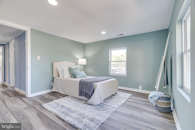 bedroom featuring light hardwood / wood-style flooring