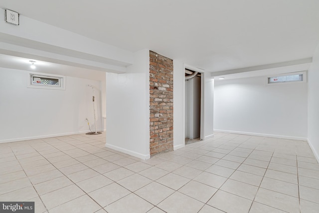 spare room with light tile patterned floors