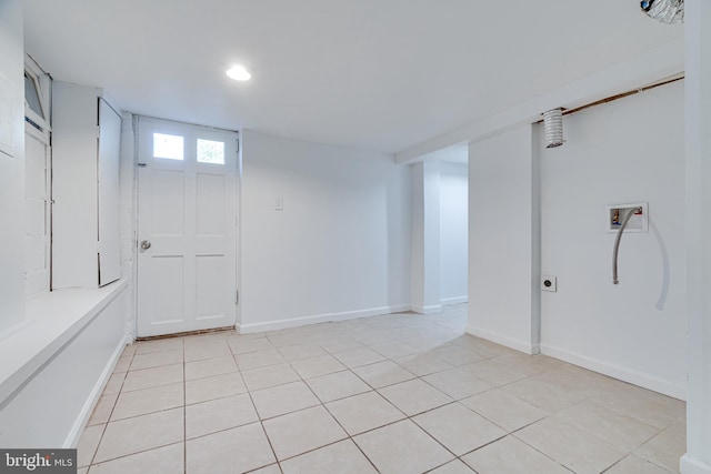 basement with light tile patterned floors