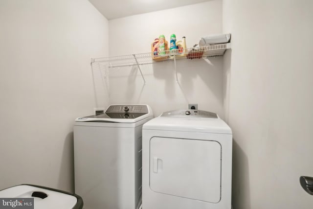 laundry area featuring independent washer and dryer