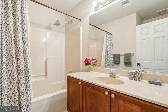 bathroom with vanity and shower / bath combination with curtain