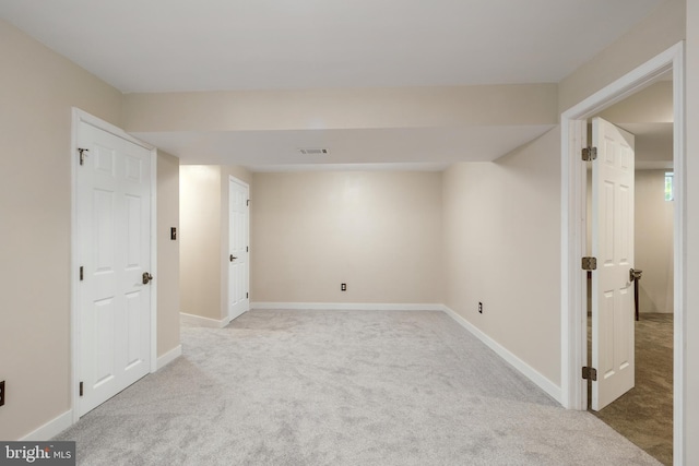 basement with light carpet