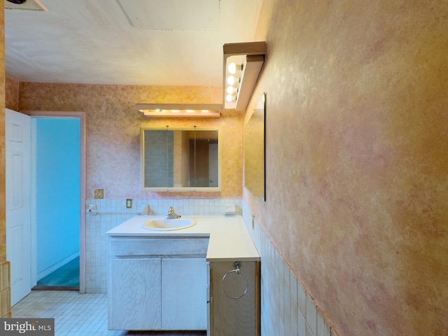 bathroom with vanity and tile patterned floors