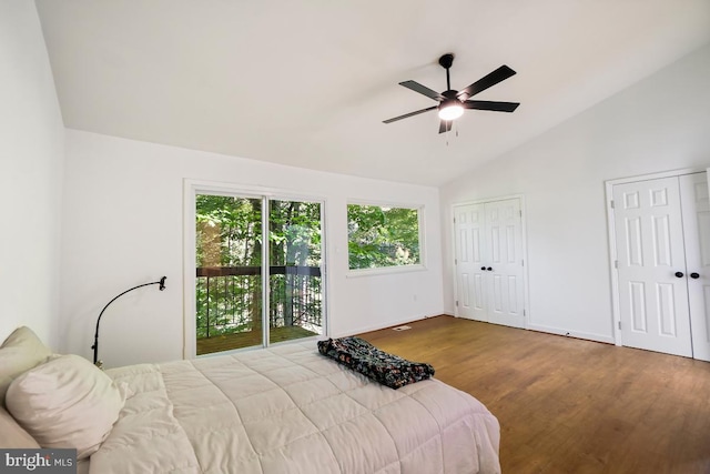 bedroom featuring ceiling fan, high vaulted ceiling, access to outside, and hardwood / wood-style floors