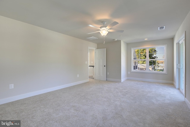 interior space with ceiling fan