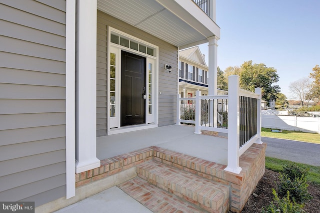 entrance to property with a balcony