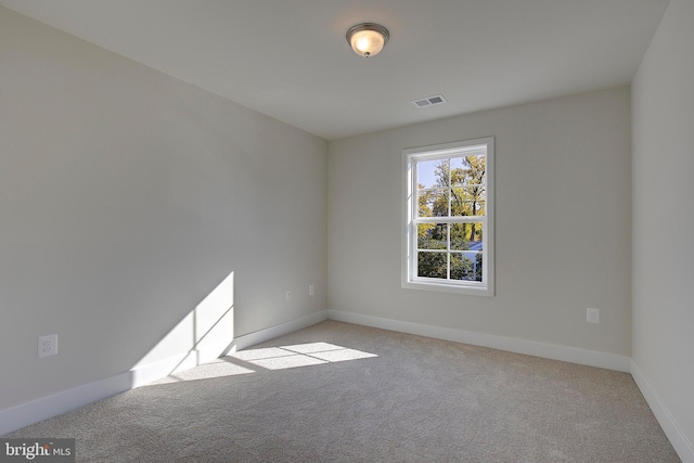 view of carpeted spare room