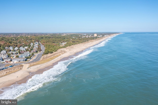 aerial view with a view of the beach and a water view