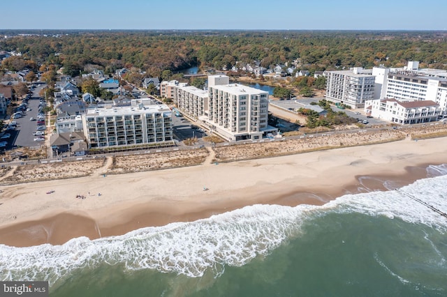 bird's eye view with a beach view and a water view