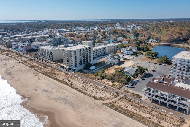 bird's eye view with a view of the beach and a water view