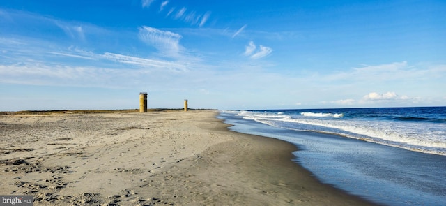 view of water feature featuring a beach view