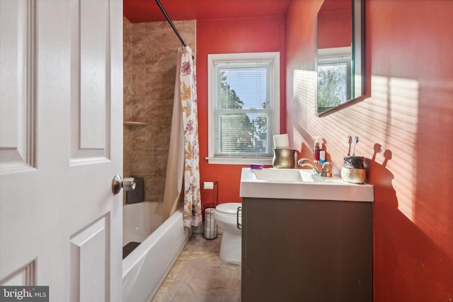 full bathroom with vanity, shower / bath combo with shower curtain, toilet, and tile patterned flooring