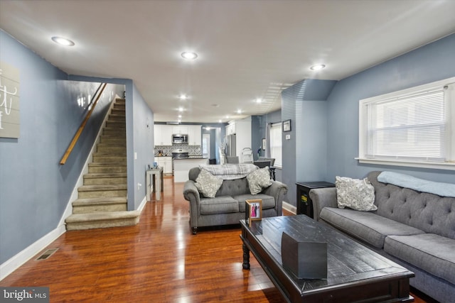 living room with wood-type flooring