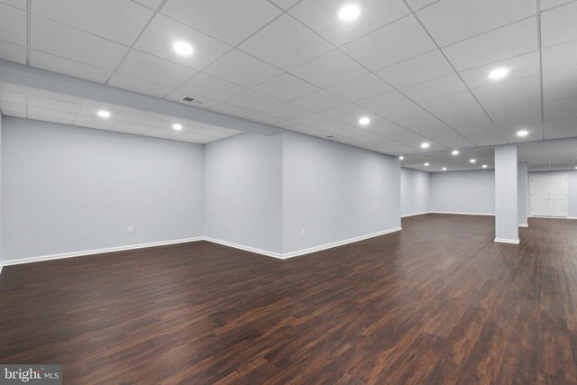 basement featuring dark wood-type flooring