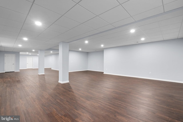 basement with dark wood-type flooring