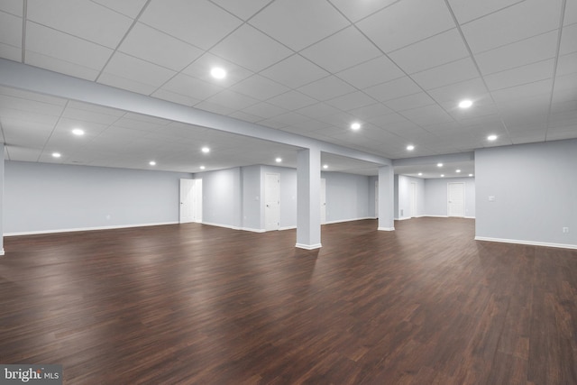 basement featuring dark wood-type flooring