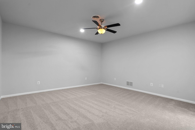 empty room with carpet and ceiling fan