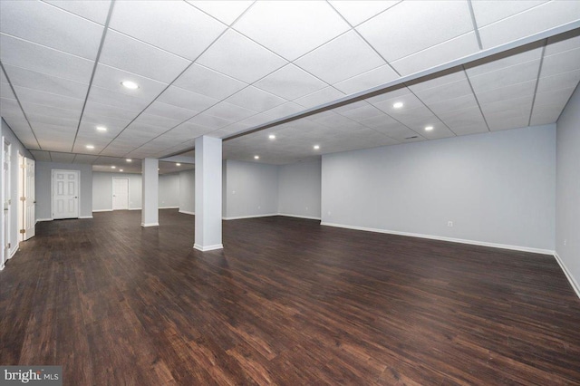 finished below grade area with wood finished floors, baseboards, and recessed lighting