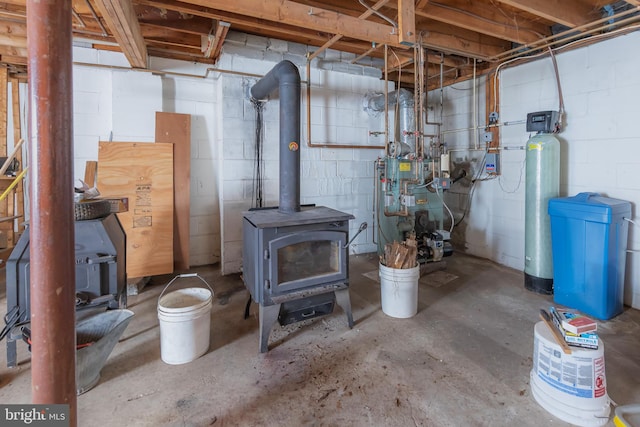 basement featuring a wood stove