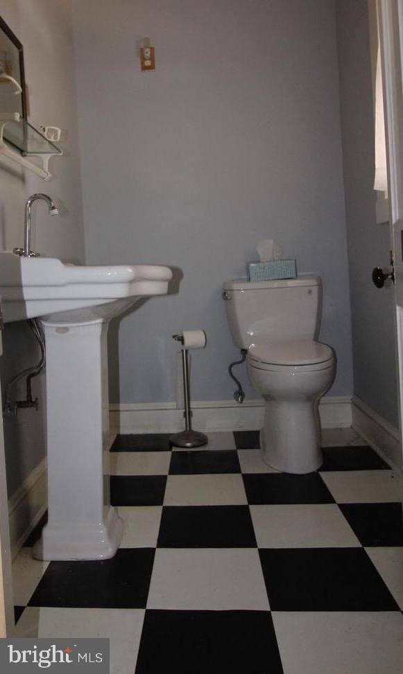 bathroom featuring toilet