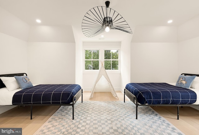 bedroom with light wood-type flooring