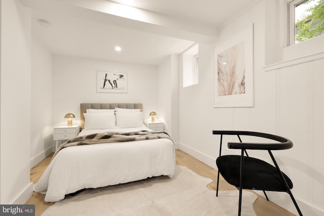 bedroom with light wood-type flooring