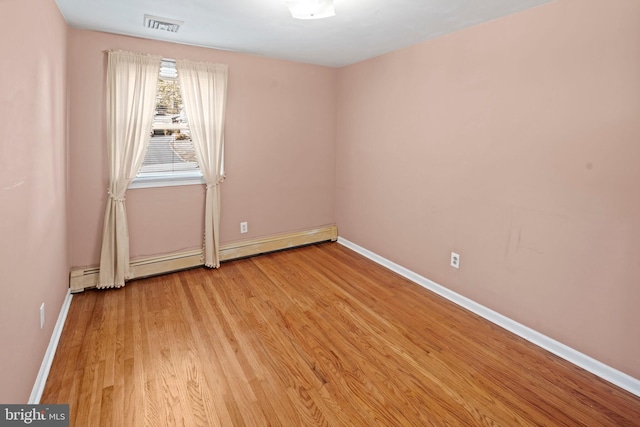 empty room with light wood-type flooring