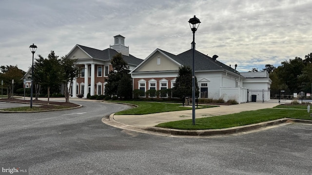 view of front of property with a front lawn