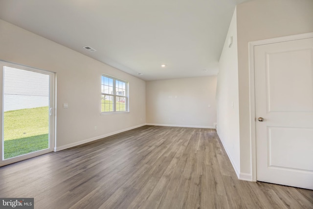 empty room with light wood-type flooring