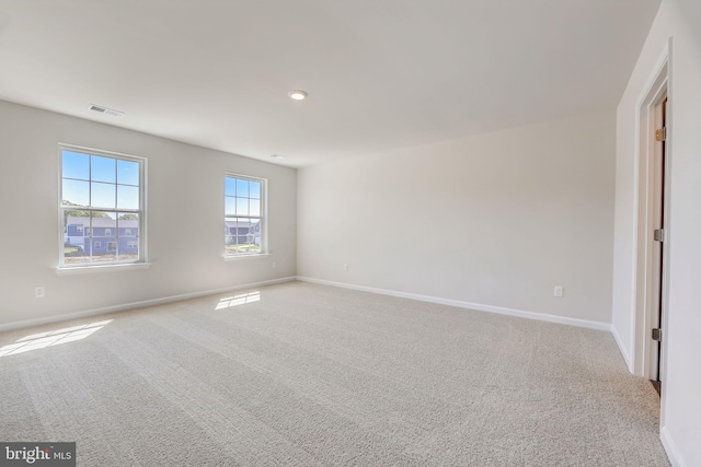 view of carpeted spare room