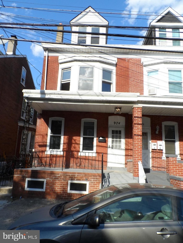 multi unit property featuring covered porch