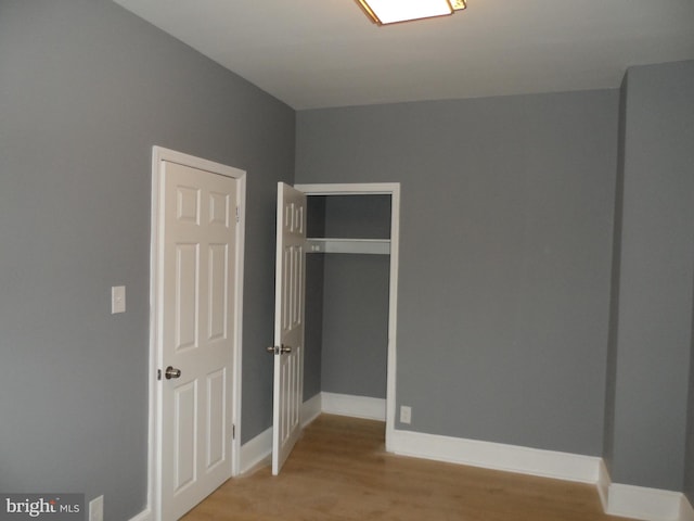 interior space featuring light hardwood / wood-style flooring and a closet