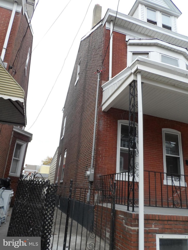 view of home's exterior featuring a porch